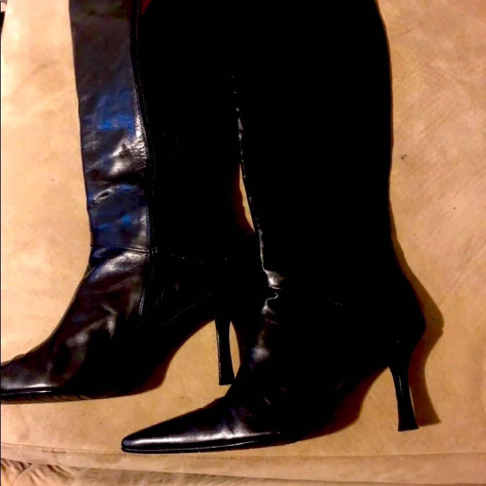 Boots knee high. Stuart Wietzman